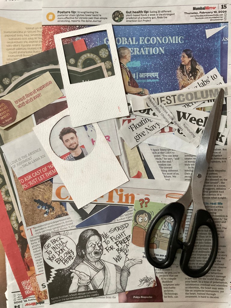 Handmade viewfinders used in nonclinical art therapy Close-up of newspaper clippings with handmade paper viewfinders and scissors used for nonclinical art therapy.